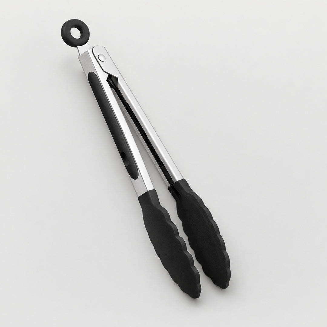 A pair of kitchen tongs with black silicone grips and a hanging loop at the top, shown on a clean light gray background.