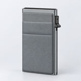 One empty gray metal and gray-front slim card wallet.