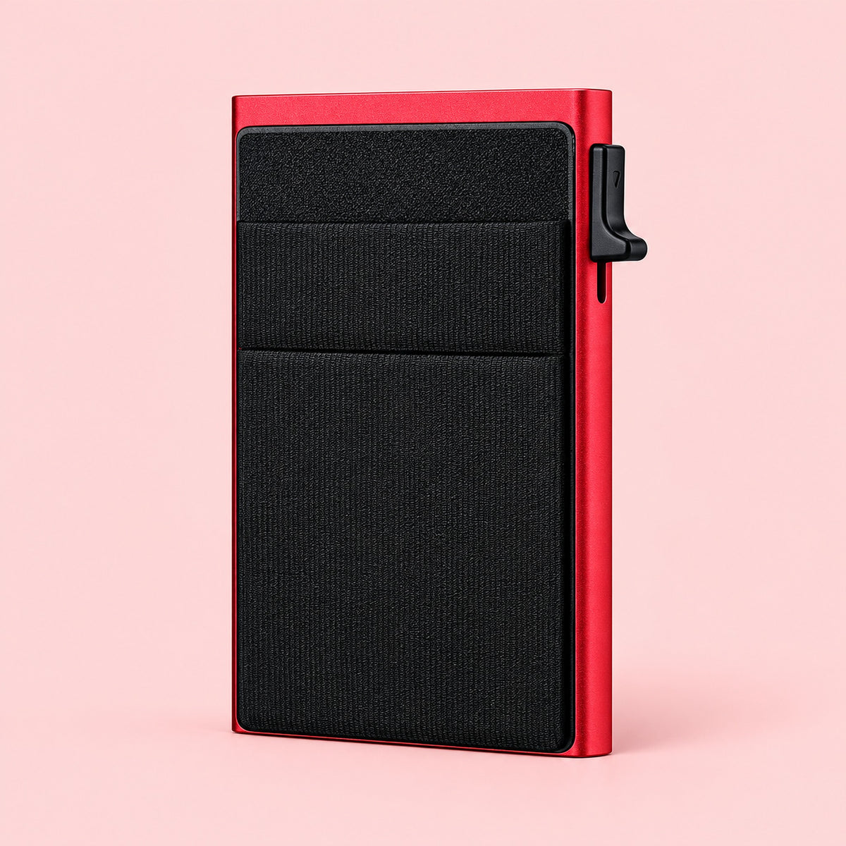 One empty red metal and black-front slim card wallet.