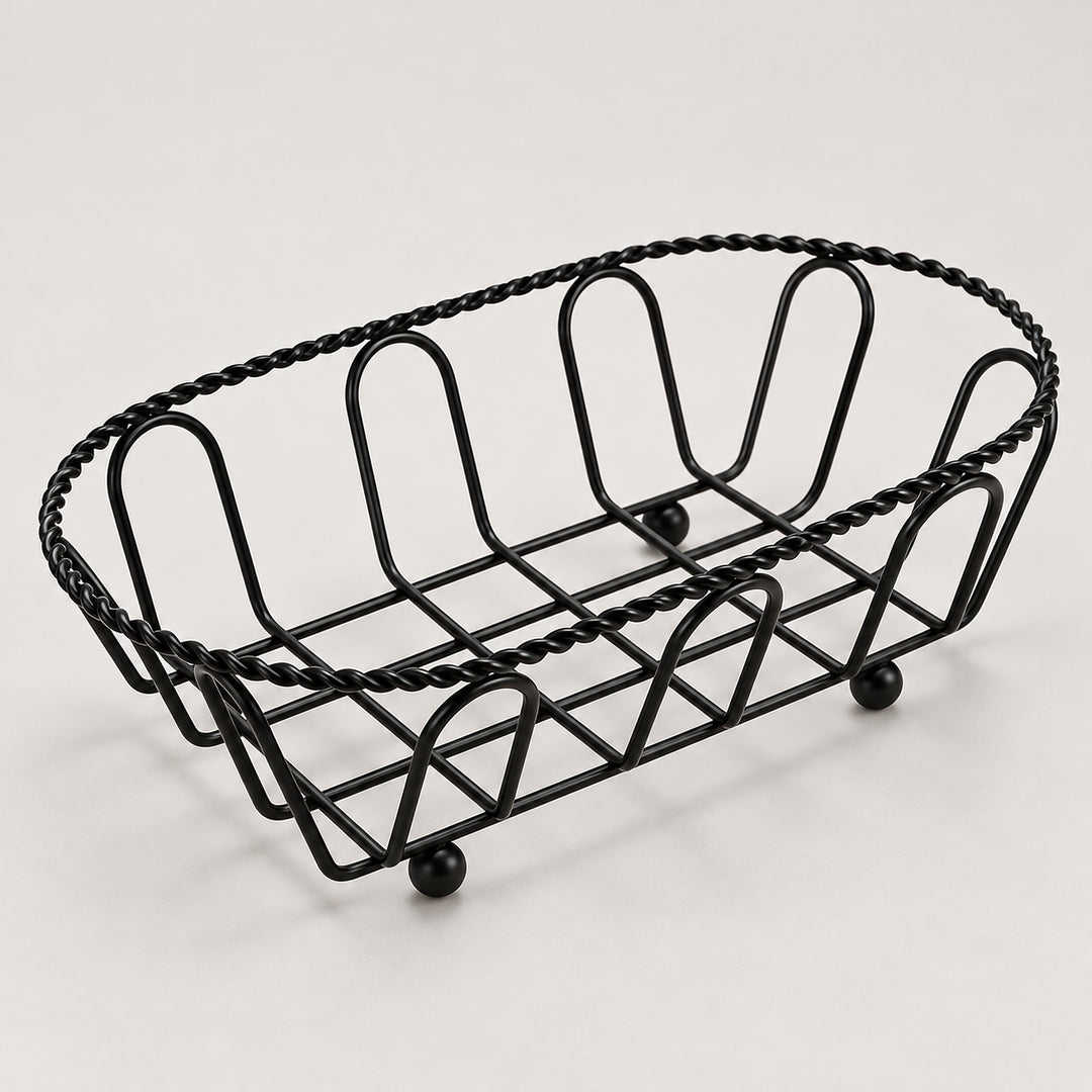Oval black wire serving basket with twisted rim and small feet, 19 cm long.